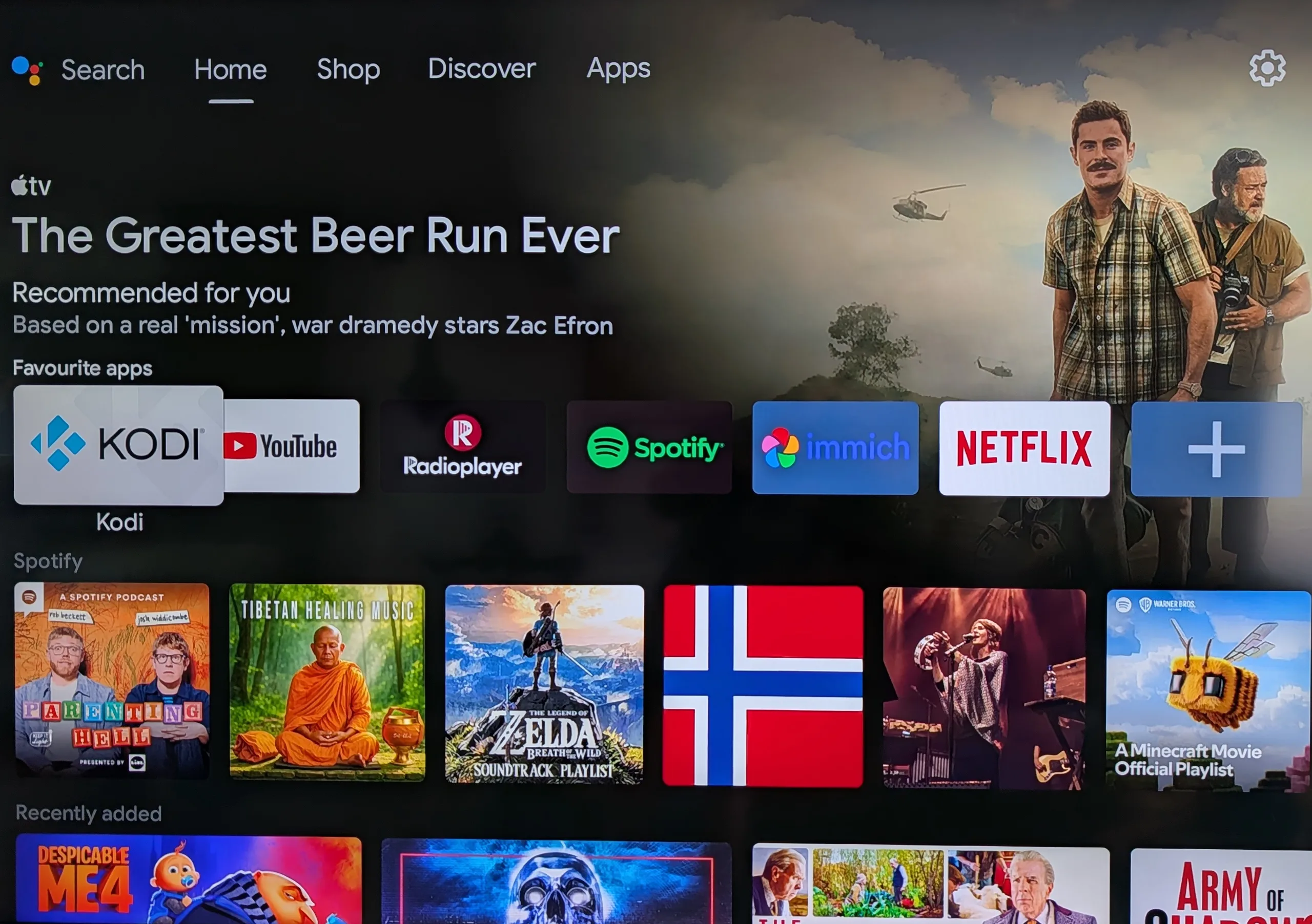 The stock Google TV launcher on the Xiaomi OLED TV, full of sponsored rows